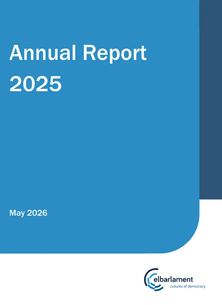 Report cover reading "Annual Report 2025" and "May 2026" on a blue background, with the elbarlament logo reading "elbarlament cultures of democracy" at the bottom.