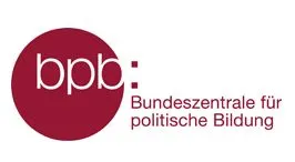 Red circular logo reading "bpb" beside the text "Bundeszentrale für politische Bildung".