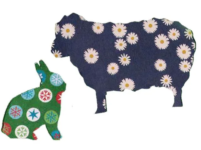 Two fabric-cutout animal shapes on a white background: a sheep patterned with daisies and a rabbit patterned with colorful snowflake circles.