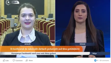 Split-screen Facebook Live video with a female reporter labeled "Hewlêr" on one side and a news anchor labeled "Rûdaw" on the other, with a Kurdish news ticker below.